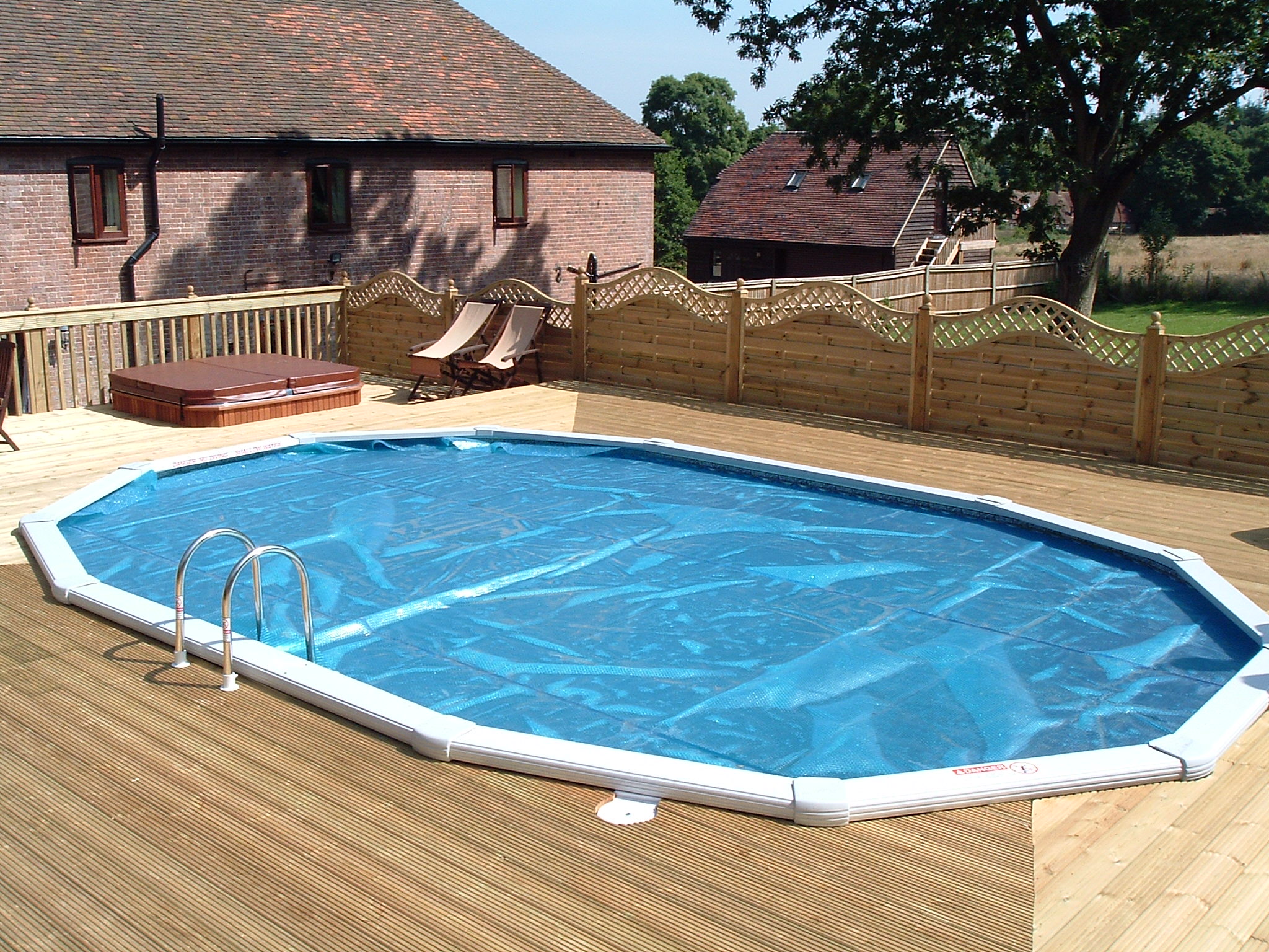 24ft x 15ft  'Classic' Aluminium Oval with surface level decking
